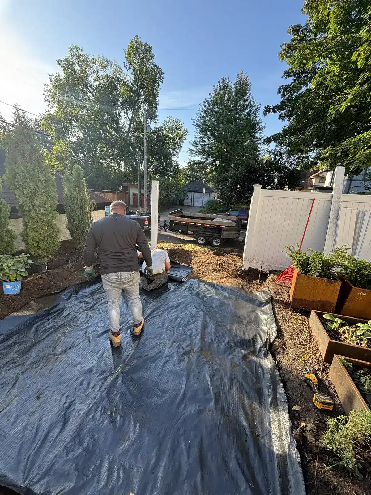 Landscape fabric base preparation for bluestone patio in Edina, MN