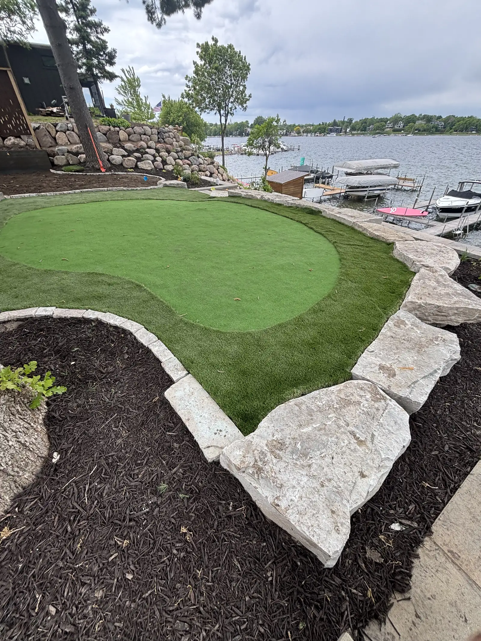Boulder retaining wall on a sloped Bloomington, MN property