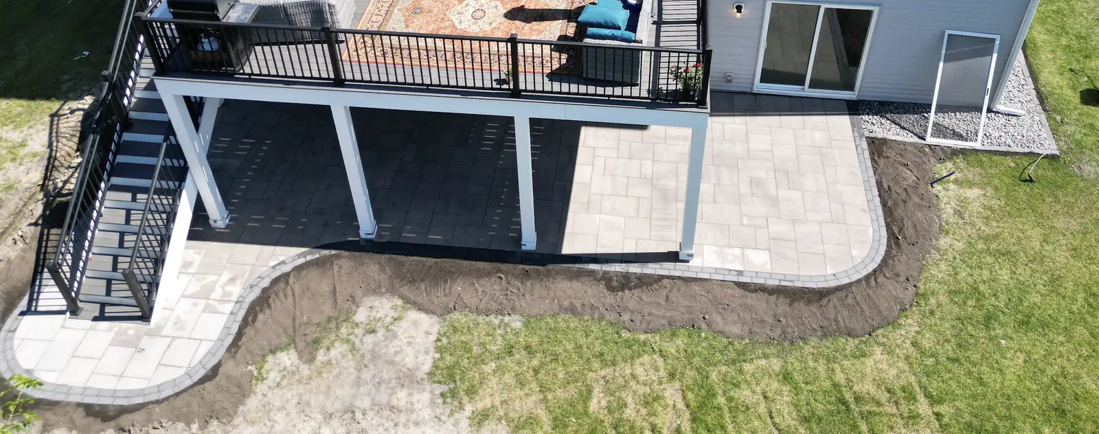 Perimeter french drain installed along a home foundation