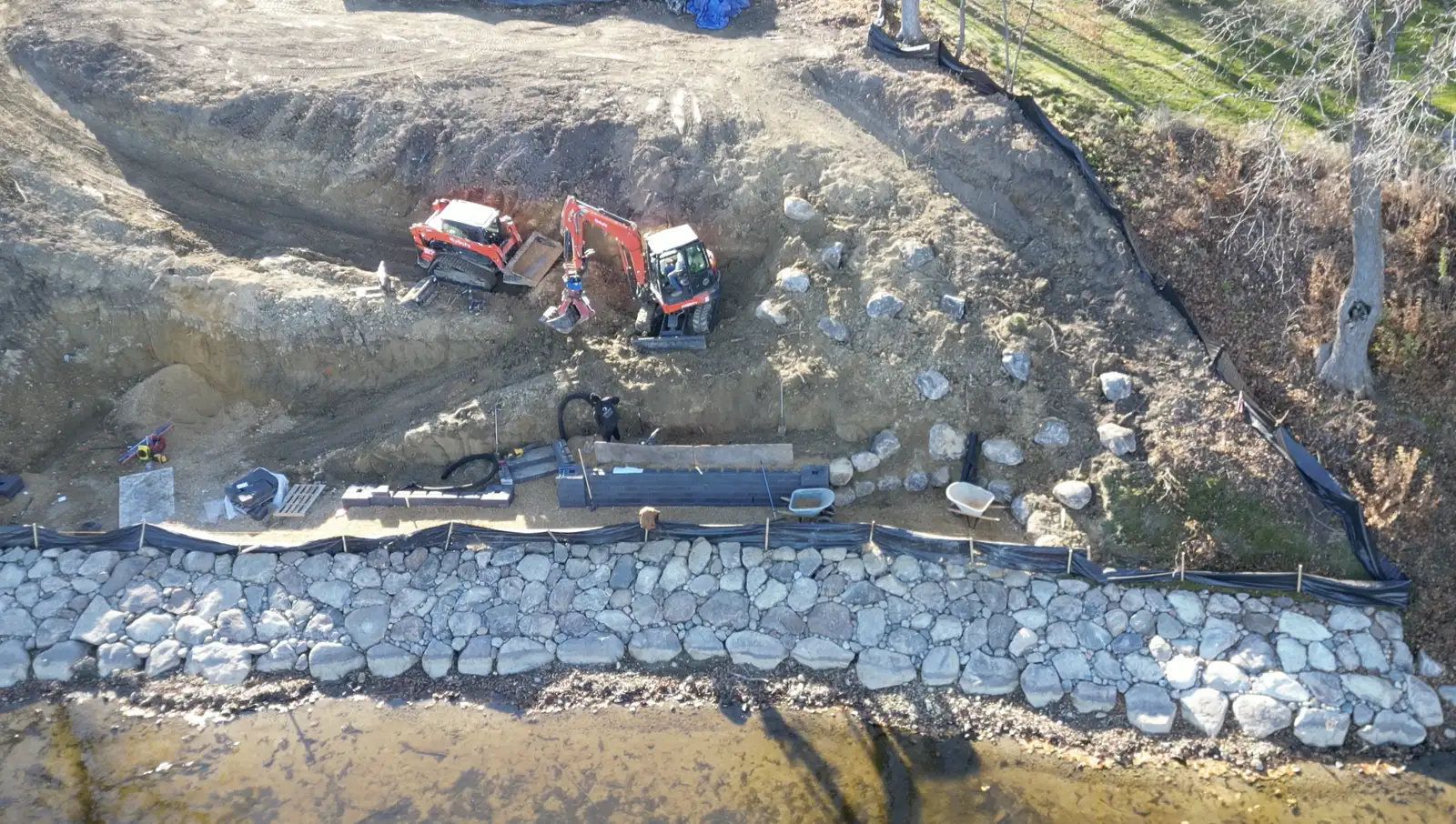 Drainage stone installation and French drain excavation for residential water management