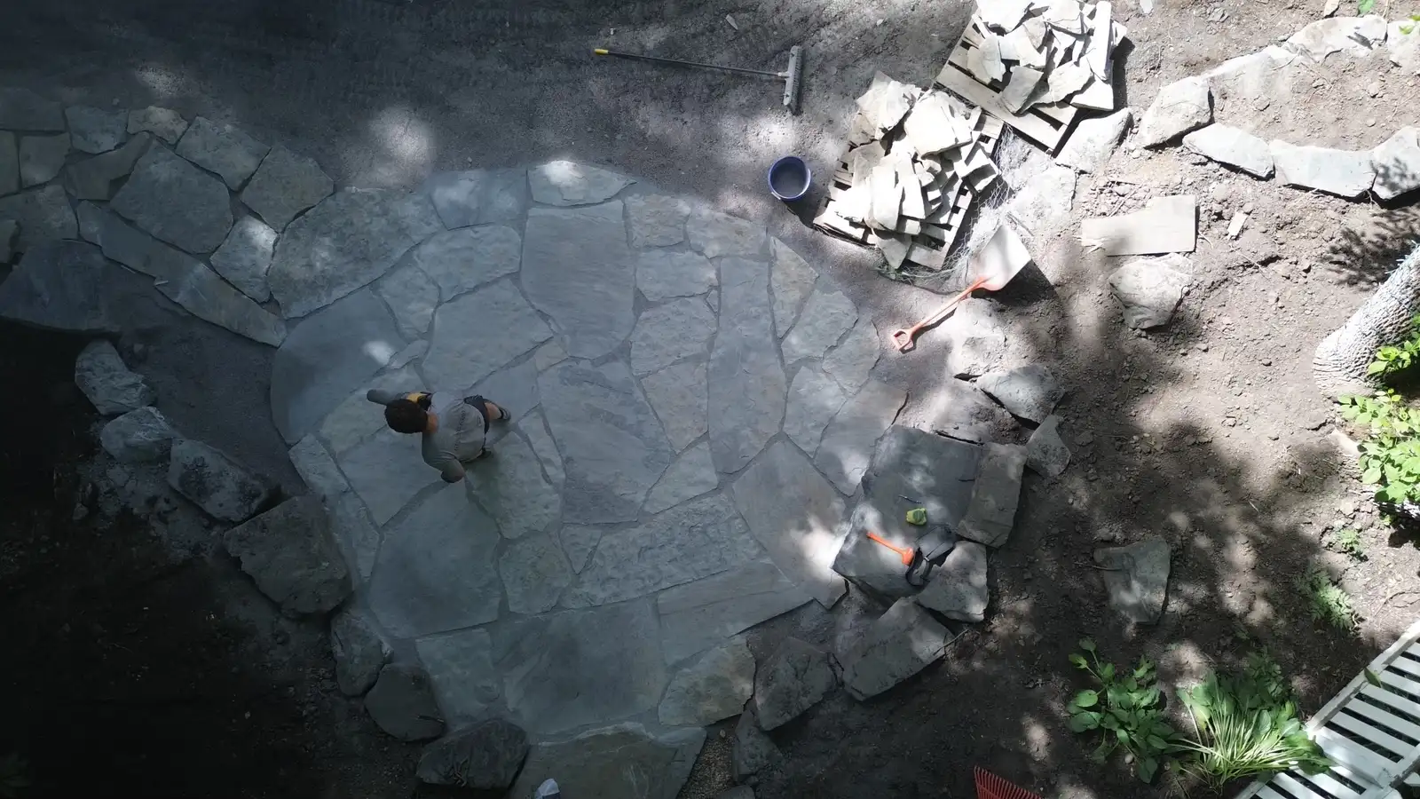 Flagstone patio layout during installation in Greenwood, MN
