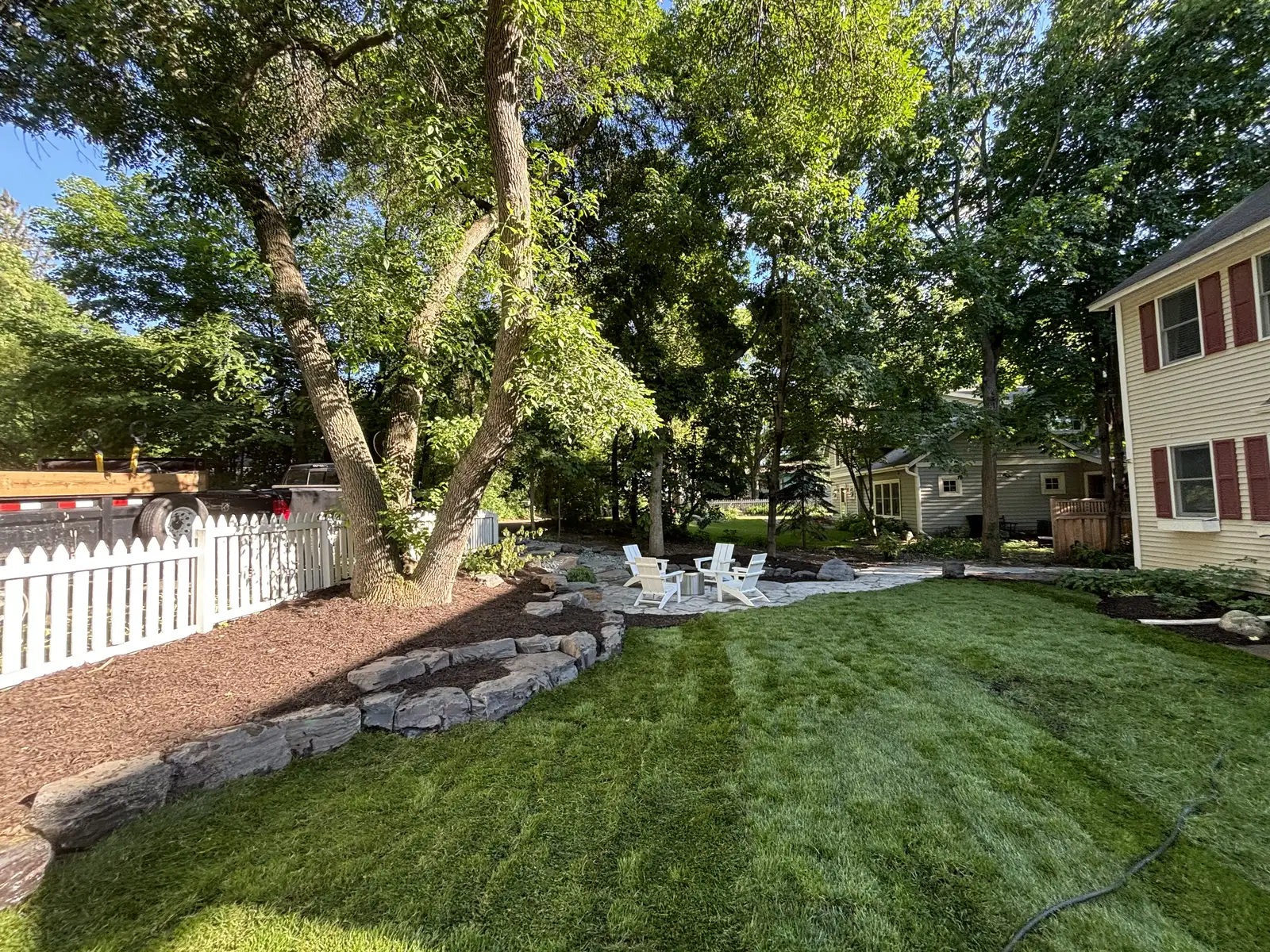 Custom Flagstone Patio & Boulder Staircase project photo — greenwood flagstone patio 07