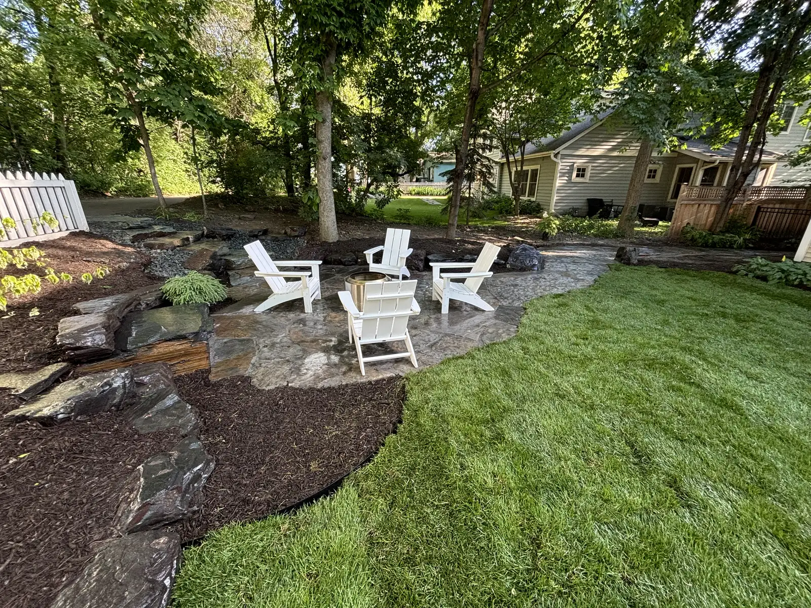 Custom Flagstone Patio & Boulder Staircase project photo — greenwood flagstone patio 13