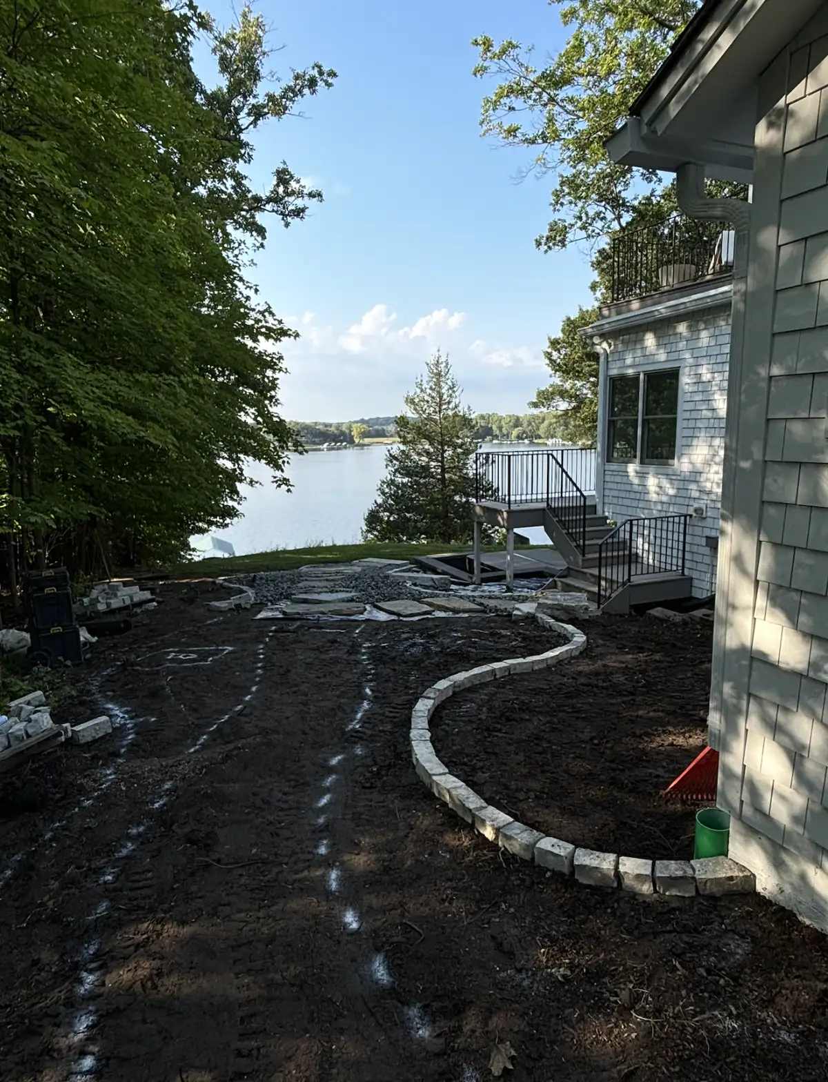 Fond du Lac natural stone edging being installed with weed barrier on lakefront property in Orono, MN